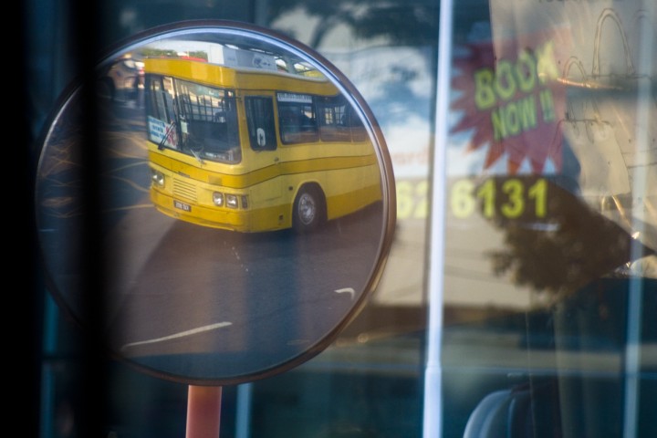 Penang Our first Bus in sideview mirror